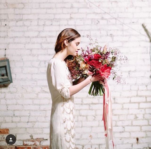 Woman Holding Flower Bouquet